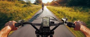 E-Bike Conversion: Transform Your Ride with the Perfect Kit 1 Ebike riding down road